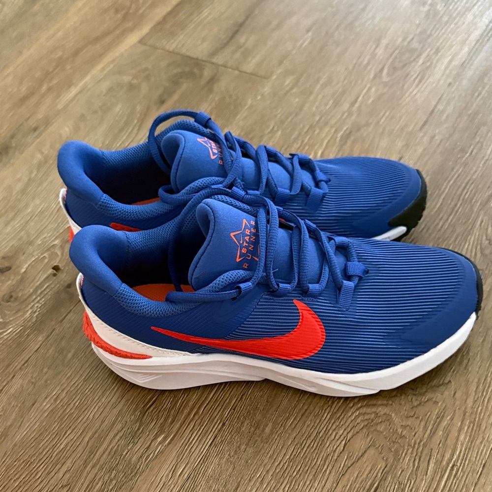 Nike Kids Blue Sneakers with Red Swoosh